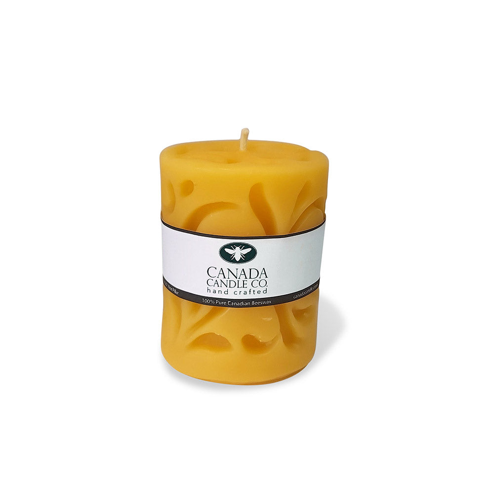 Decoarative carved Beeswax Pillar candle  3 by 3.75 inches